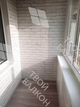 Отделка балкона и установка потайного люка