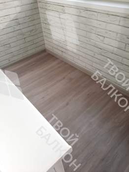 Отделка балкона и установка потайного люка