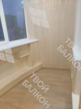 Теплое остекление балкона и отделка вагонкой