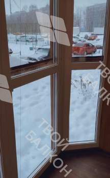 Панорамное остекление балкона и отделка ламинатом и панелями ПВХ