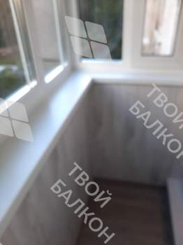 Отделка и остекление Г-образного балкона