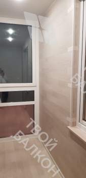 Панорамное остекление с тонировкой и отделка балкона