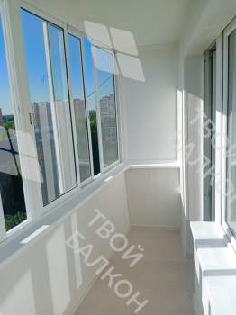 Остекление балкона и отделка стен