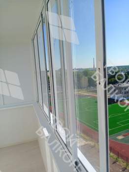 Остекление балкона и отделка стен