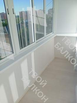 Остекление балкона и отделка стен