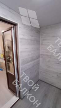 Отделка балкона с установкой теплого пола и остекление Rehau 70