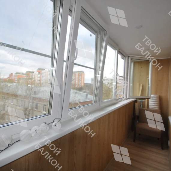 Остекление лоджии окнами с мультифункциональным стеклопакетом и отделка